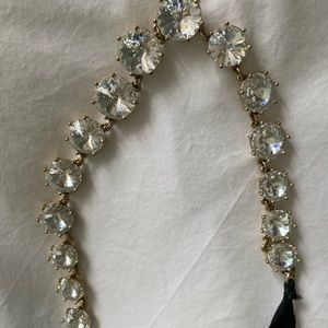 Rhinestone necklace with black ribbon tie